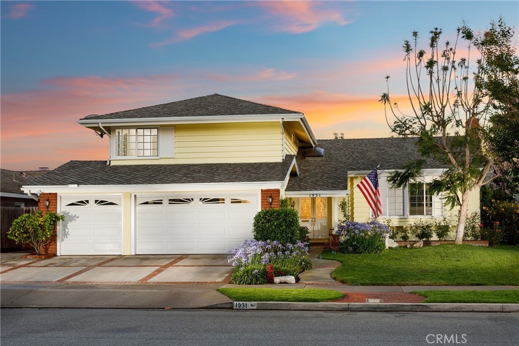 1931 Swan Drive — front elevation at twilight